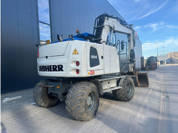 Pelle sur pneus Liebherr A914: photos 5