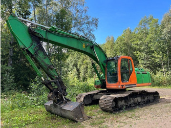 Pelle sur chenille NEW HOLLAND E215B