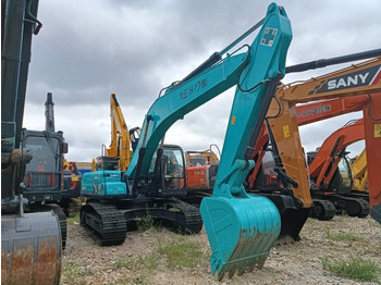 Pelle sur chenille Kobelco SK 210: photos 2