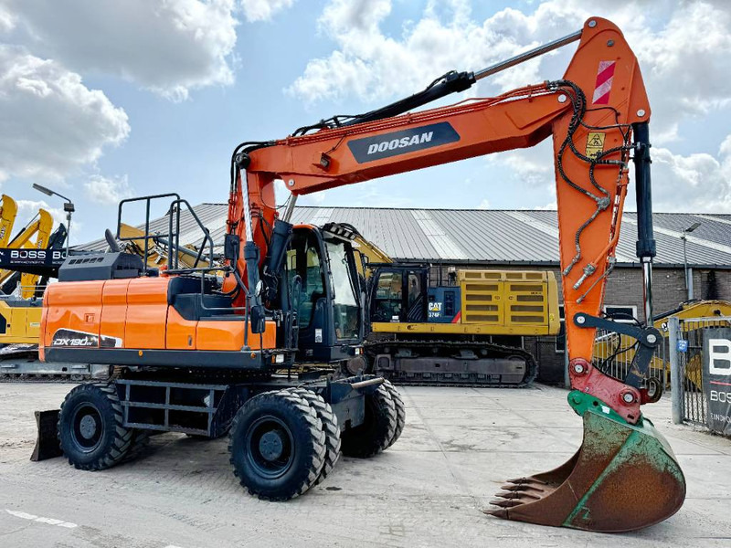 Pelle sur pneus Doosan DX190W-5 - German Machine / Triple Boom: photos 6