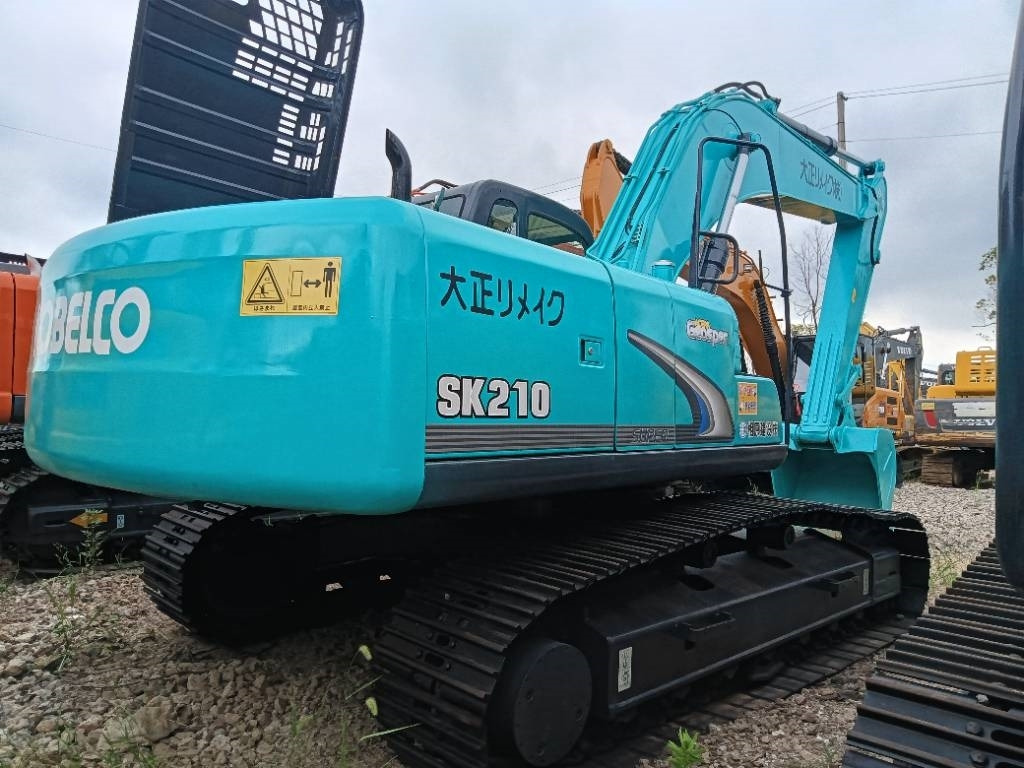 Pelle sur chenille Kobelco SK 210: photos 9