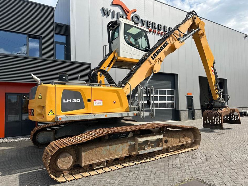 Pelle de manutention pour transport de déchets Liebherr LH 30 C: photos 10